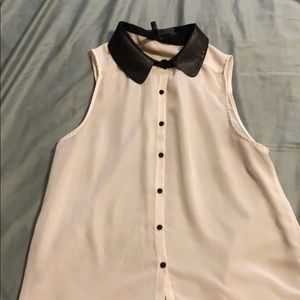 White sleeveless w/ black faux leather collar